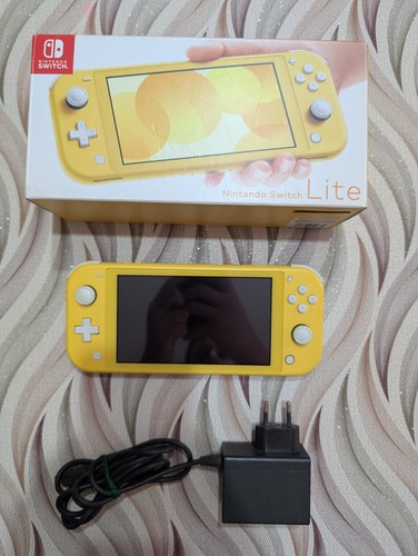 Nintendo switch lite yellow - nintendo,